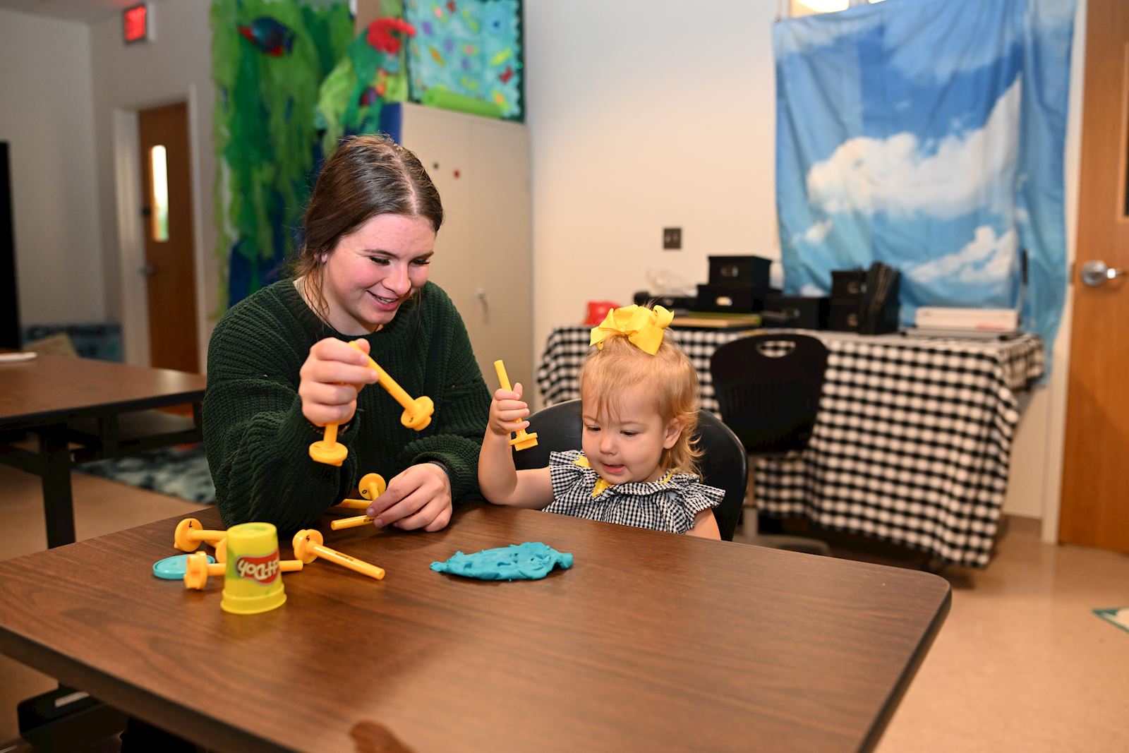 TVCC early education student teaches young student                                                                                          