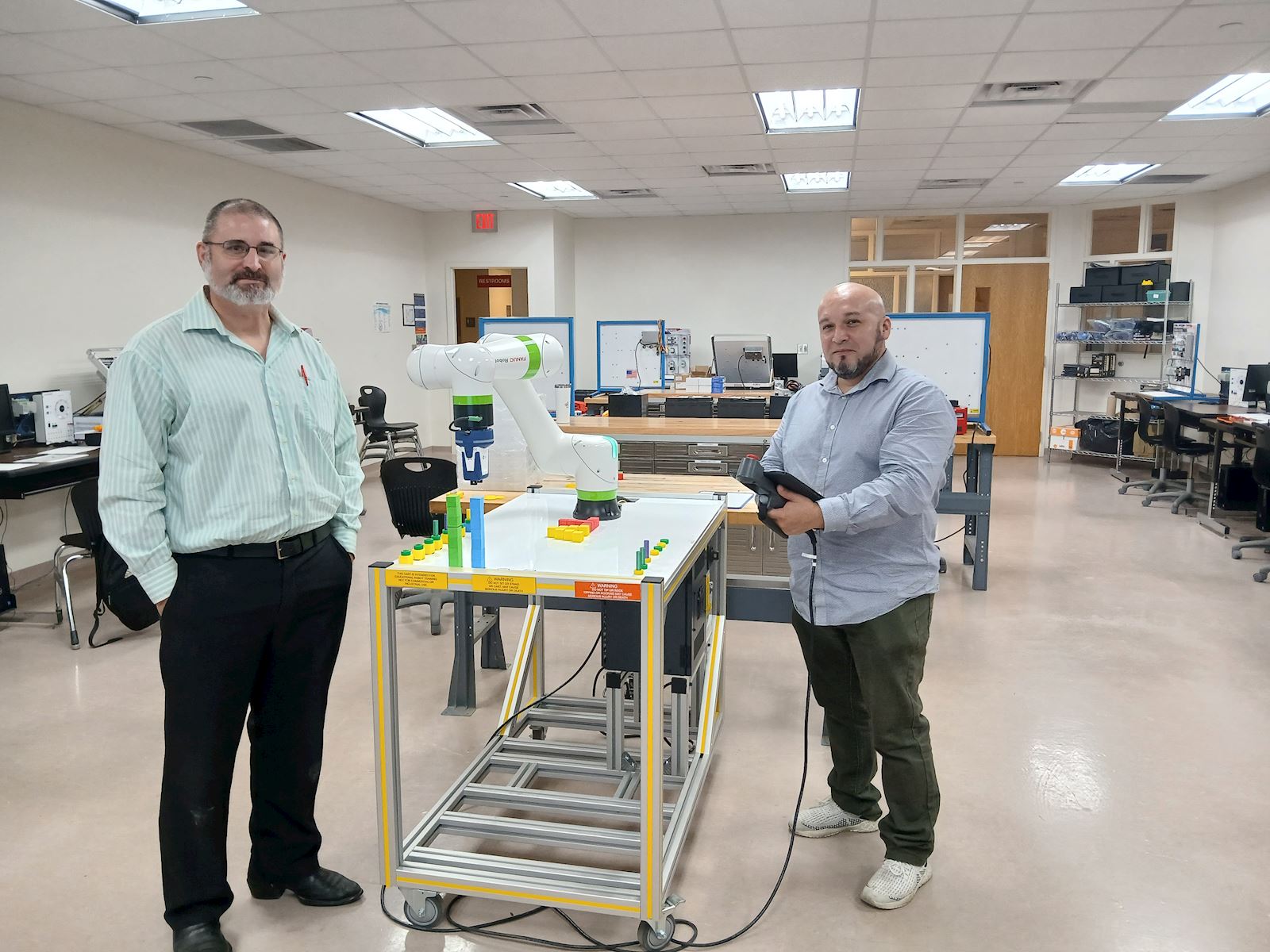 Automation Training Instructor Ronn Herod and student Gustavo Chavez showcases the lab.                                                     